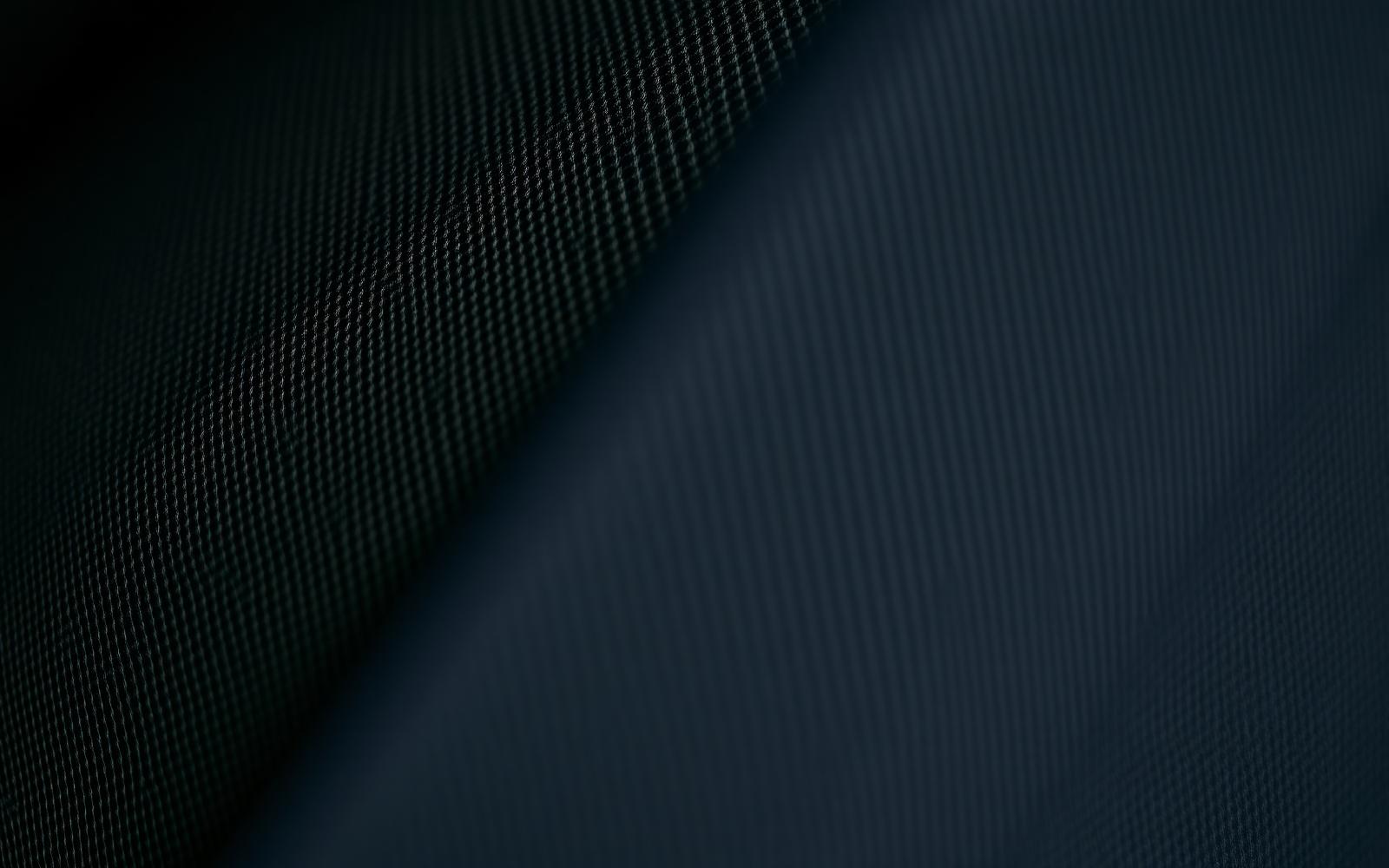 Macro detail of dark coated technical protective textile